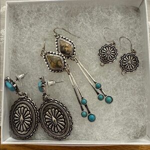 Three pair of western style earrings